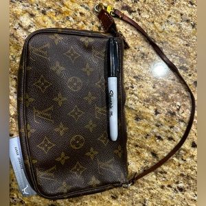 Used Louis Vuitton pochette.